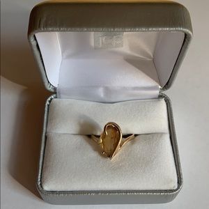 Gold ring with yellow citrine stone